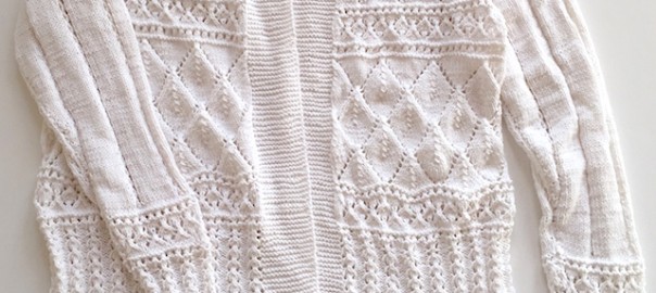 Feine weiße Baumwoll-Jacke in verschiedenen Ajour-Mustern/Lochmustern